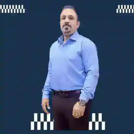 ألاستاذ حسن الكعبي مدرس اللغة العربية